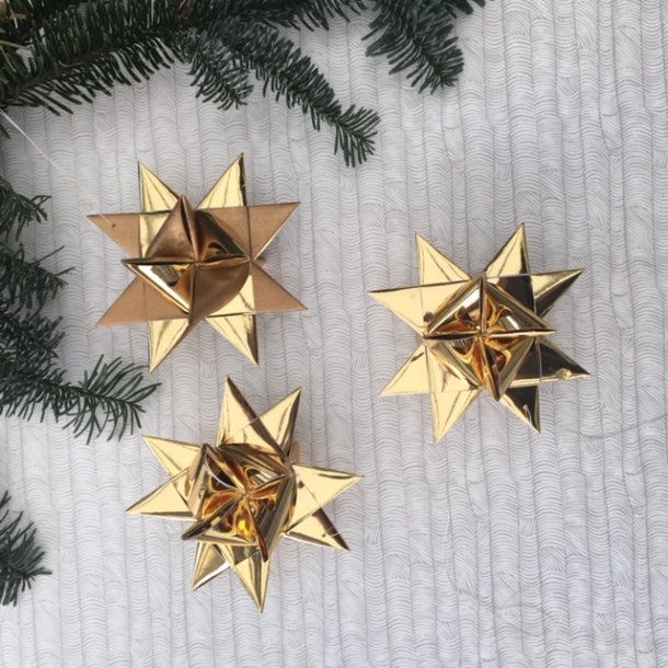 Tre hndflettede papirstjerner, guld 10 cm